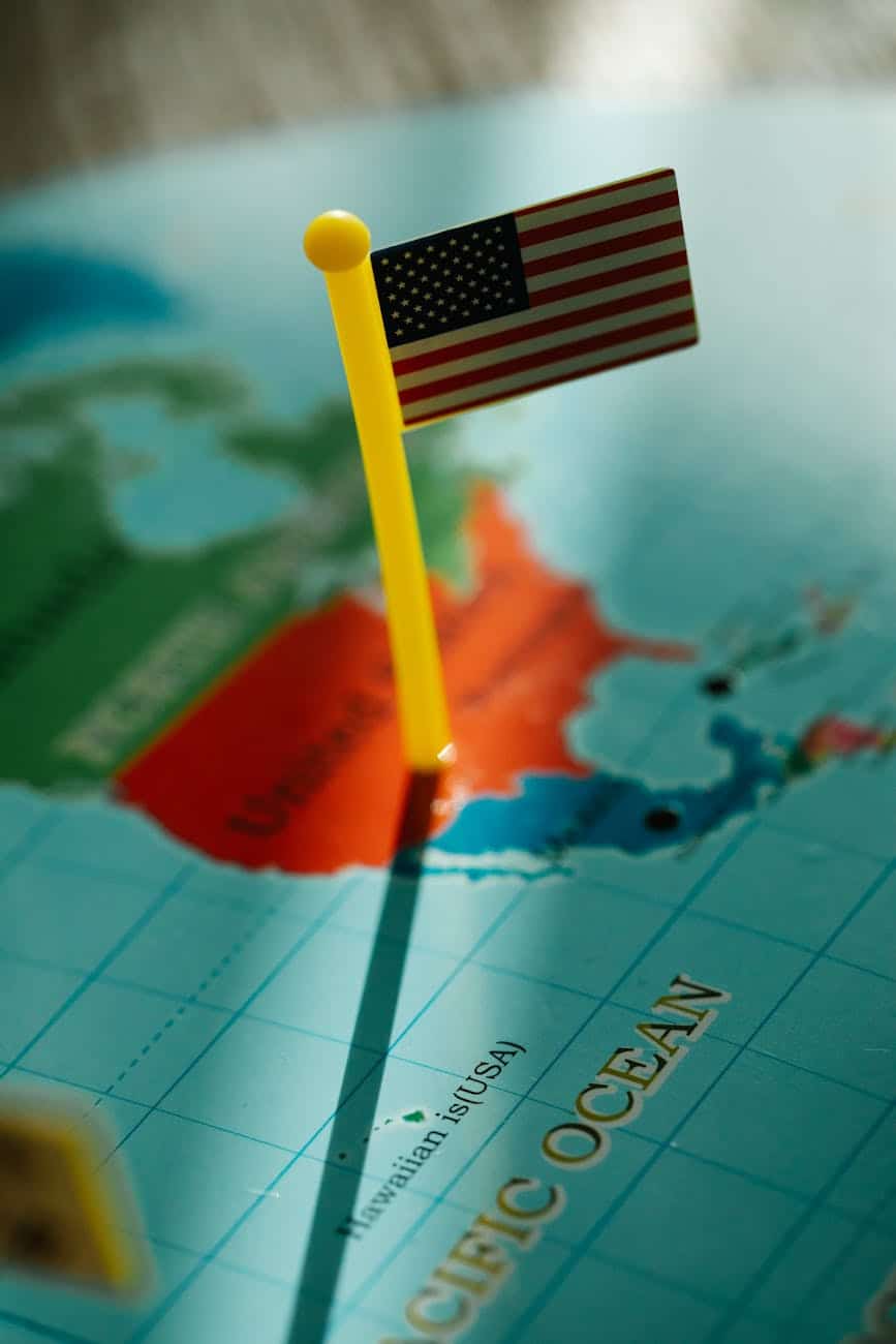 paper flag on country on map