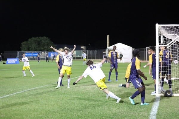 JUCO soccer team celebrating a goal at the NJCAA level
